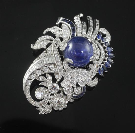 A modern ornate white gold and platinum, sapphire and diamond set clip brooch, 64mm.